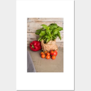 Fresh basil and other ingredients for Italian cuisine. Cherry tomatoes, basil and red pepper Posters and Art